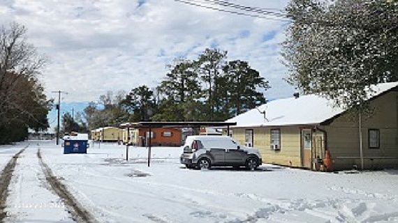 Unit 3 duplex in front of car.