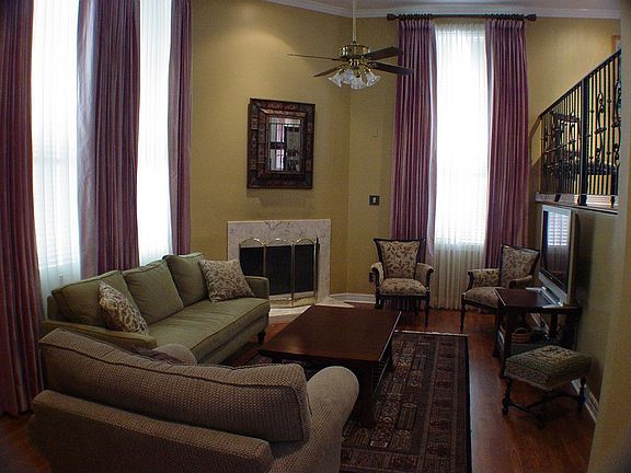 Living area overlooked by dining area