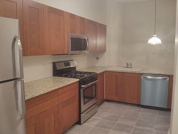 Open concept kitchen flows to dining area