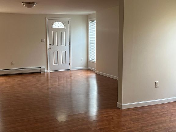 Entrance, plus living room, and part of the dining area