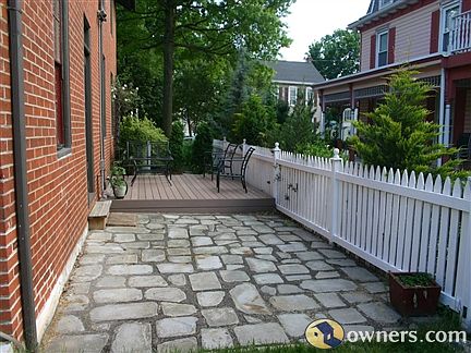 side stone patio and deck