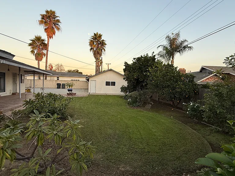 BACKYARD IS PERFECT FOR PETS FRIENDLY AS IS ALL BLOCK WALLS AND FENCED