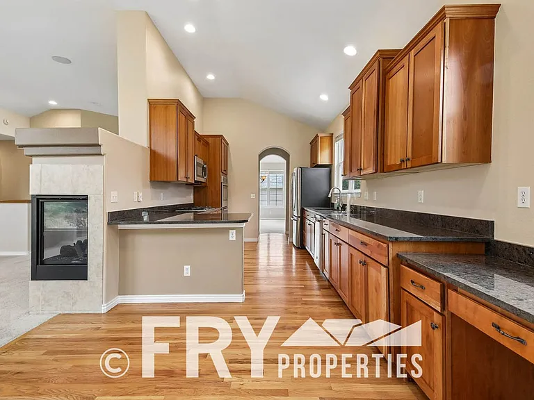 12975 W 77th Dr — Photo 11