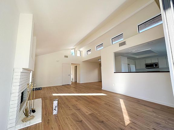 Living room into kitchen and dining room