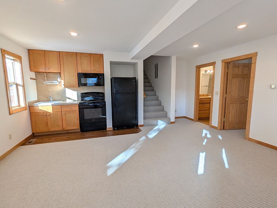 New carpet and wooden flooring around kitchenette, Freshly painted and