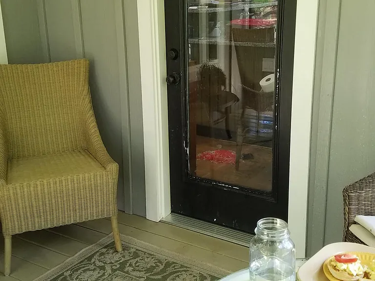 Screen porch with dining and sitting area