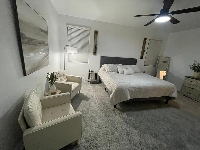 Master Bedroom with a King size bed.