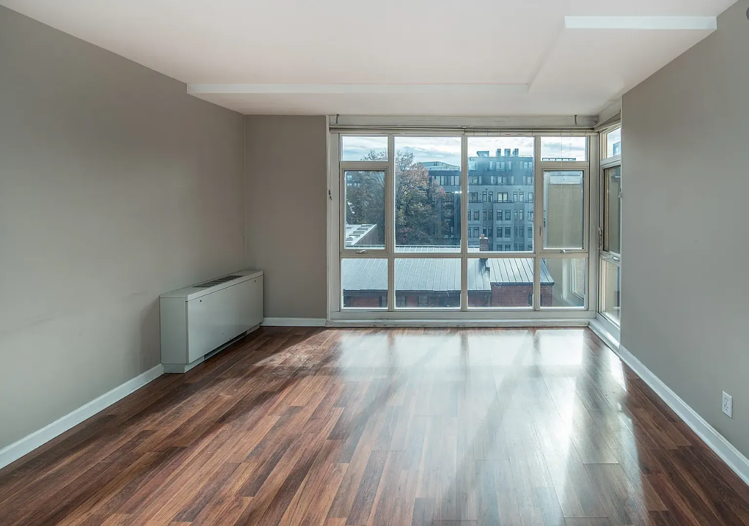Bright fifth-floor one-bedroom in the heart of Dupont Circle with floor-to-ceiling windows and an... — Photo 4