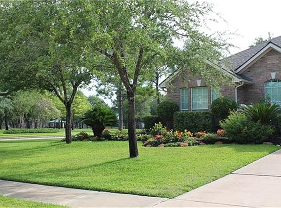 HOME SITS ON A CORNER LOT IN DESIRED CINCO RANCH