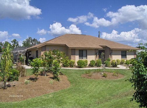 Lush Landscaping Islands on Corner Lot