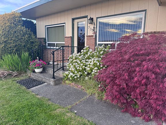 Landscaped home. Faces west. 
New windows.