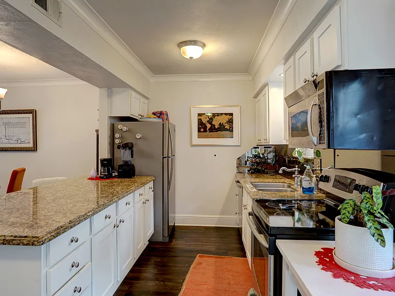 7736 Meadow Rd #102 — Photo 9