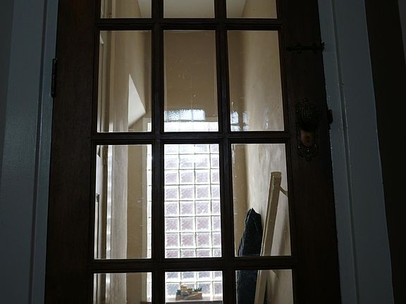 Interior door to unit at top of stairs