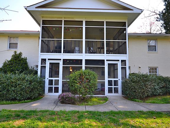 Screened porch on top left overlooking a large backyard.