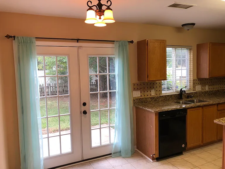 French Door Leading to Fenced Backyard