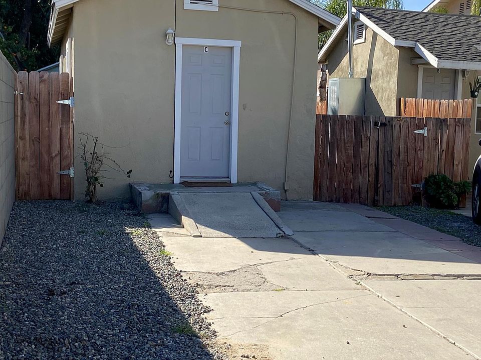 outside with the front parking space