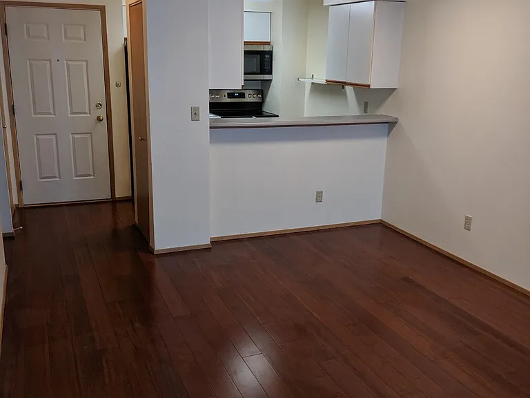 One bedroom unit, open kitchen.