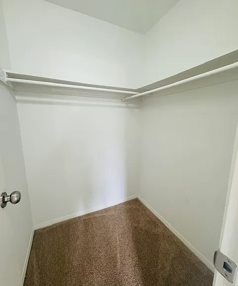 PRIMARY BEDROOM WALK IN CLOSET