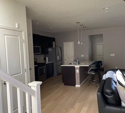 View from front door to kitchen, living room and dining room