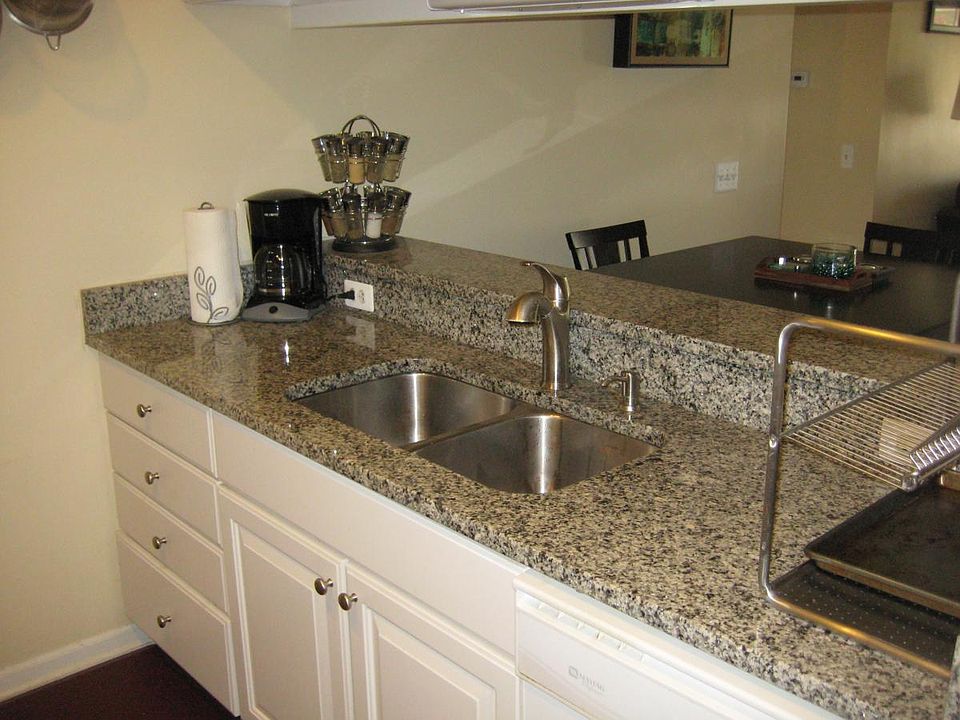 Granite Kitchen with Raised Bar Overhang