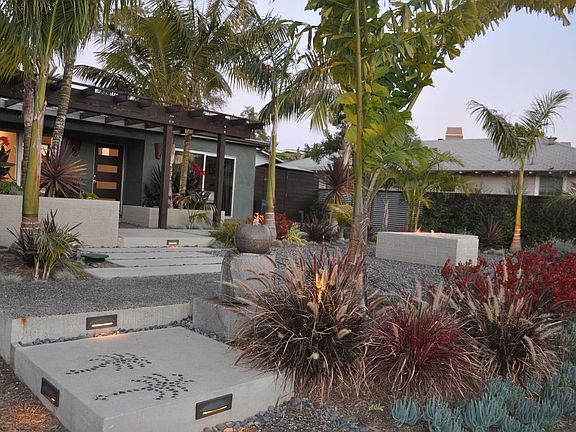 Front Yard with Beautiful Landscaping/Fire Pit & Water Featu