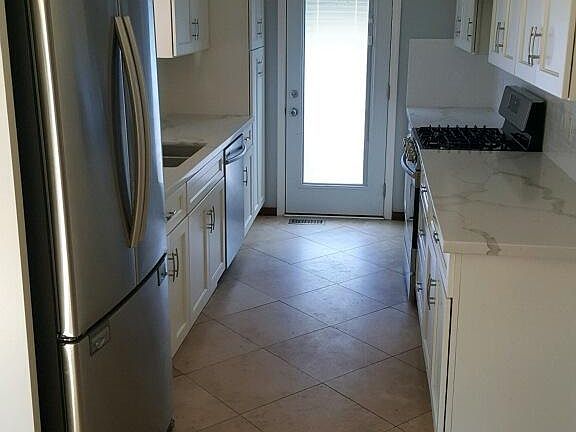 Brand new kitchen, new appliances, new cabinets and stone co