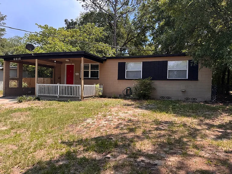 6816 Gaillardia Rd S — Photo 2