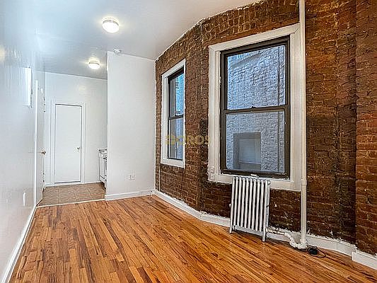 2nd image of 217 E 10th St APT 12