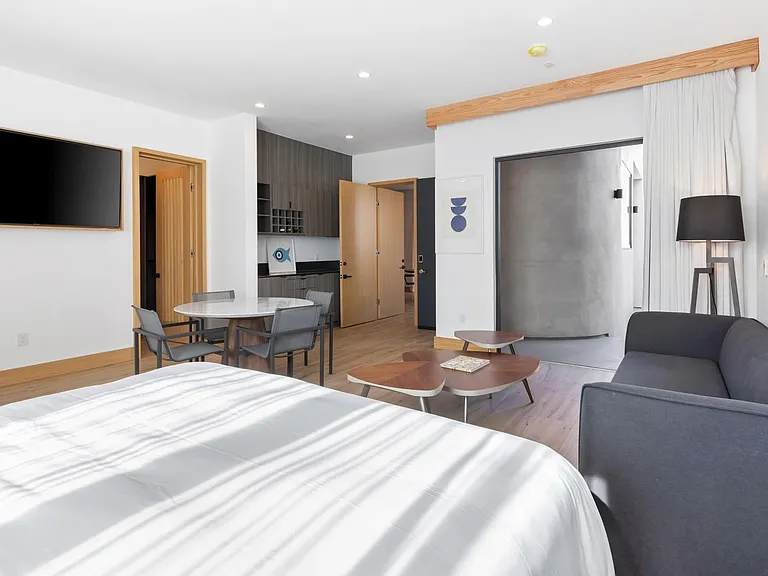 Sit back and unwind in front of the flat-screen TV.