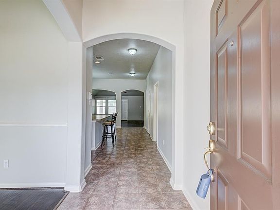 Come inside to see all the features this home has to offer.  The grand entry has archways and ceramic tile.  This home has been freshly painted and is ready for immediate move in.
