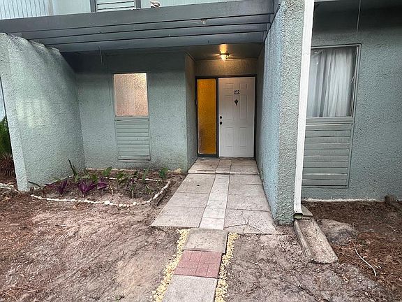 Front entry close up and garden.