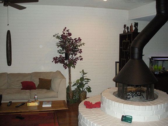 Unique fireplace in center of living room
