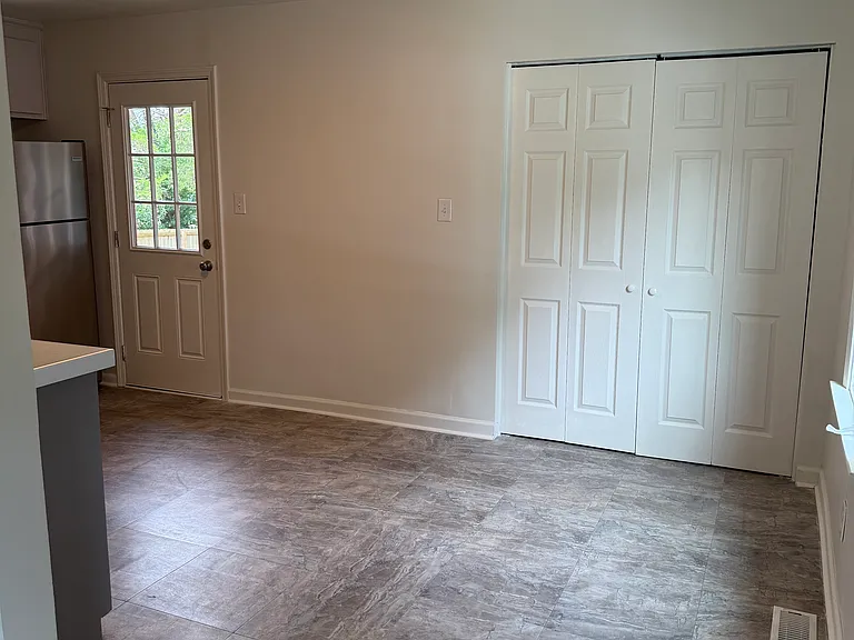 Cozy dining area and laundry closet