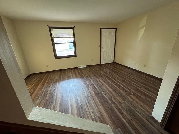 View from other side of living area looking at front door