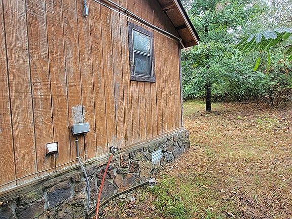 side of house/Bath window