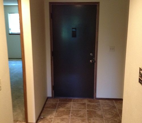Front door and Bedroom from Living Room