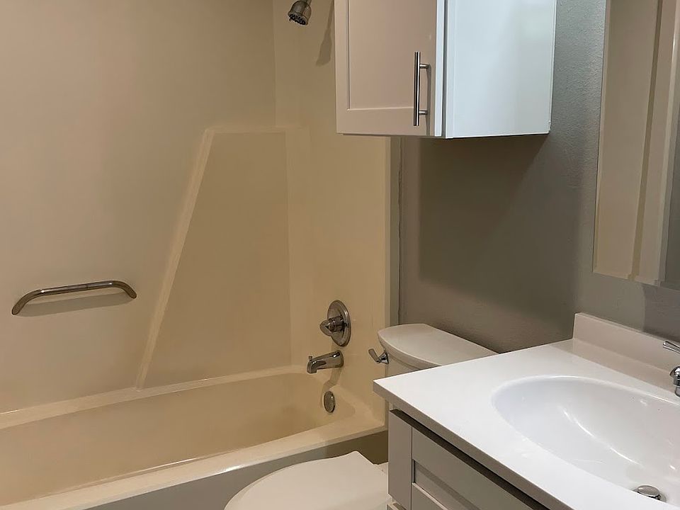 Bathroom comes with updated lighting and extra storage cabinet, also with slow-close feature.
