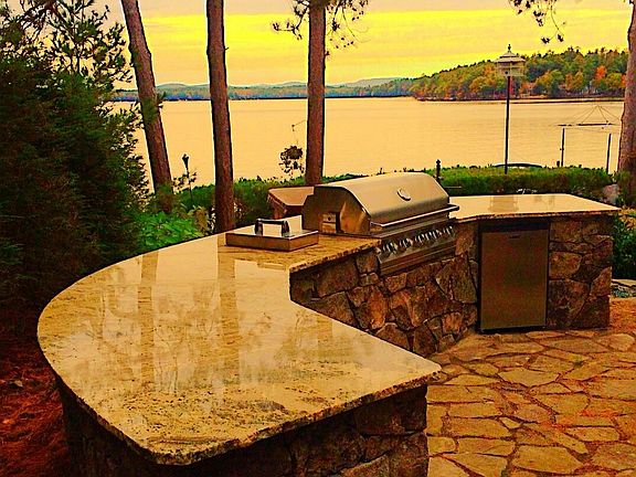 outdoor kitchen with fridge