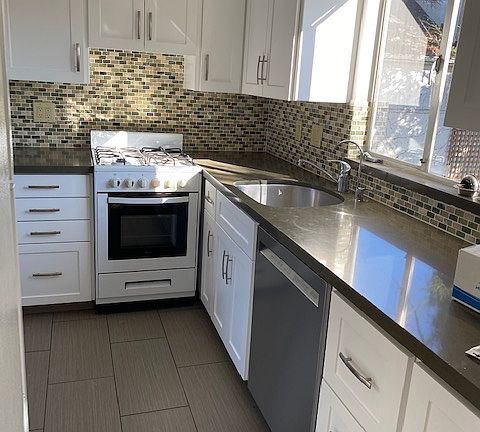 remodeled kitchen with built-in water purifier