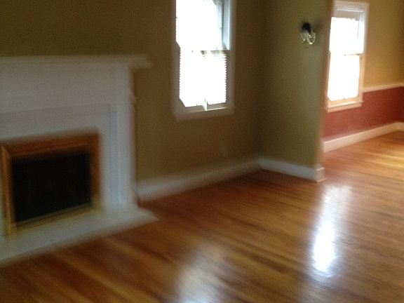 Living room with masonry fireplace