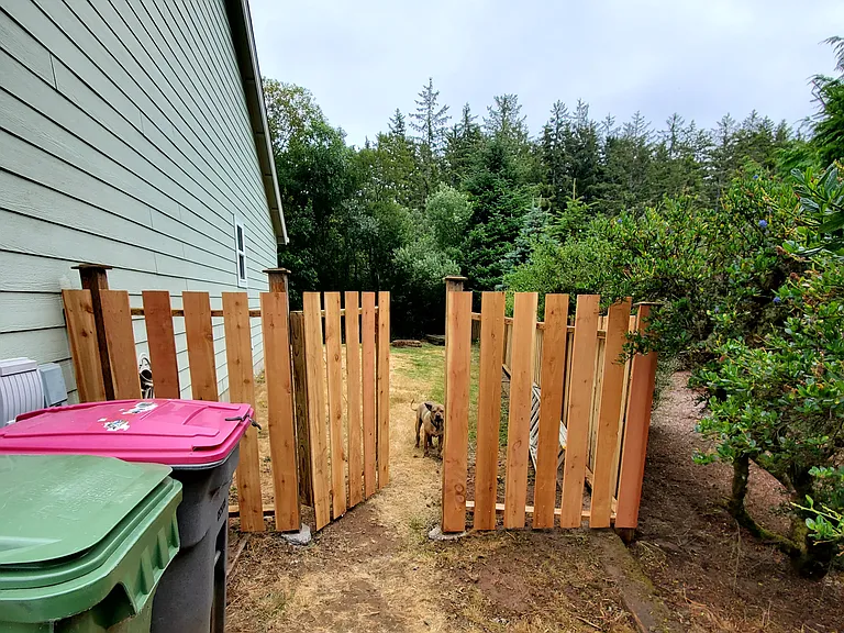 Fenced on three sides, backs up to greenspace.