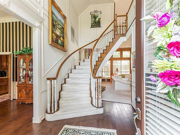 Upon entering you will see the sweeping staircase and exquisite paneling