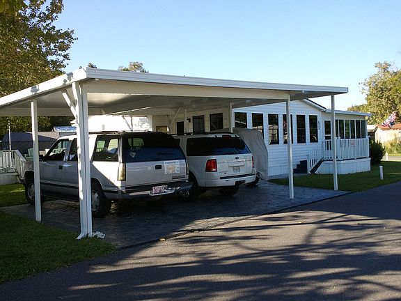 Two vehicle carport