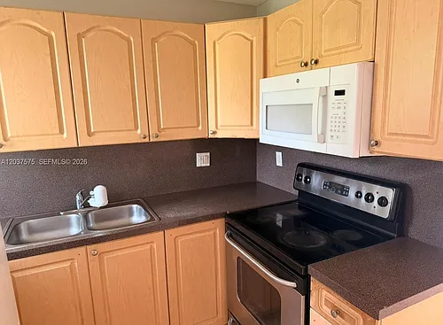 591 NW 65th St #104 Photo 1