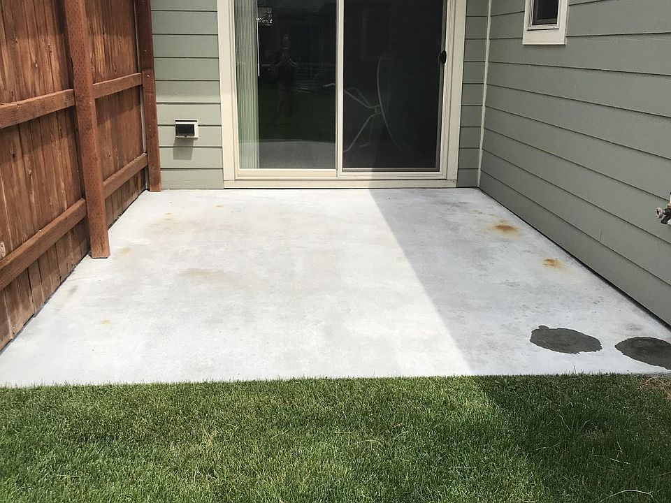 Semi private outdoor patio area off living room. 