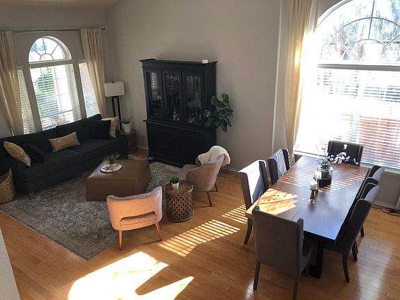 Vaulted ceilings make this a welcoming opening to the house.