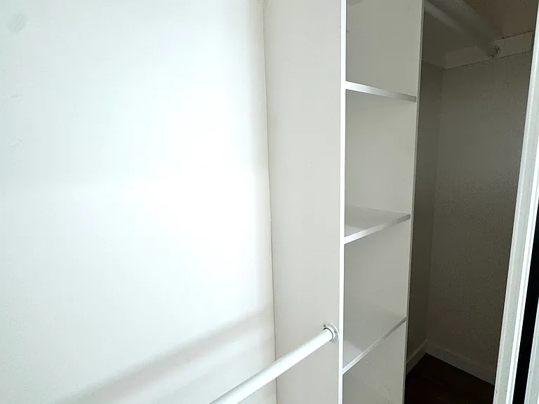 Bedroom 1 functional closet with shelving