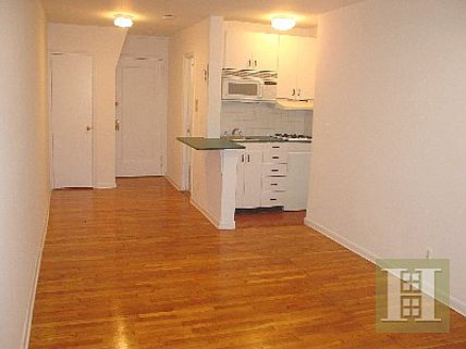 2nd image of 310 E 12th St APT 1E