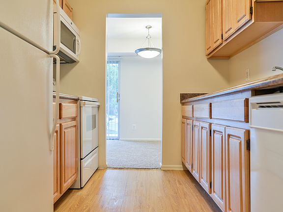 Abundance of parallel cabinets and stylish countertops