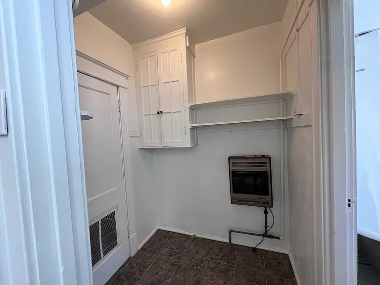 Built in storage continues as you venture through the doorway off of the kitchen.